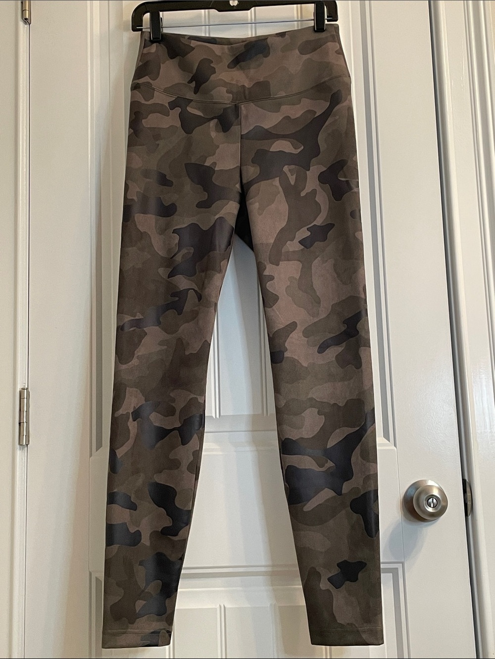 White House Black Market Camo Leggings in Olive green, grey and black.